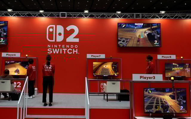 An attendee plays with the Nintendo Switch 2 gaming device at a media event in Tokyo, Japan April 3, 2025. REUTERS/Kim Kyung-Hoon/File Photo