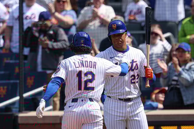 Francisco Lindor celebrates his home run with Juan Soto.