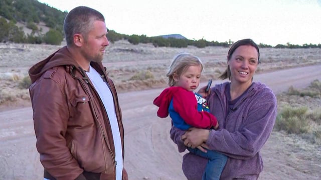 2-year-old Bowden Allen with his parents Cory and Sarah Allen.