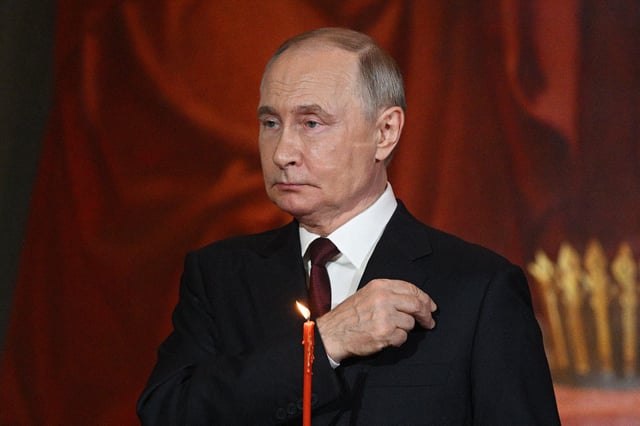 Russia's President Vladimir Putin attends an Orthodox Easter service at the Christ the Saviour Cathedral in Moscow on Sunday.