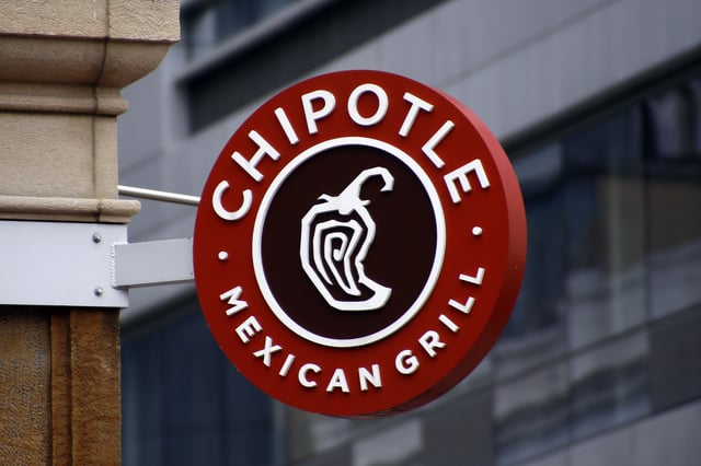 FILE - A sign for the Chipotle restaurant in Pittsburgh's Market Square is seen on Feb. 8, 2016. (AP Photo/Keith Srakocic, File)
