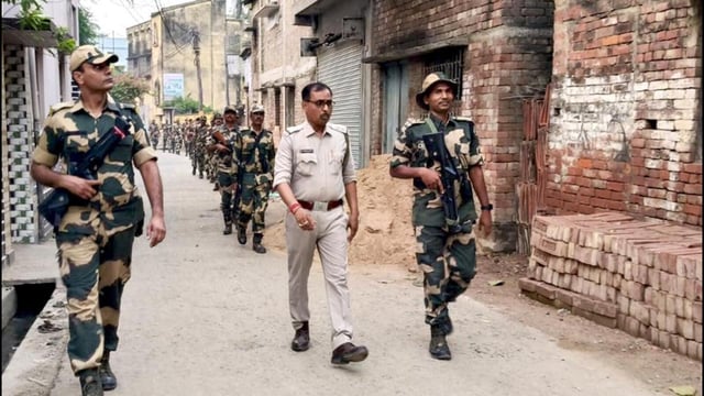 Security personnel keep vigilin Murshidabad on Sunday. (PTI)