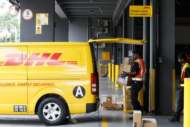 DHL will suspend delivery of packages valued above $800 to consumers in the U.S.