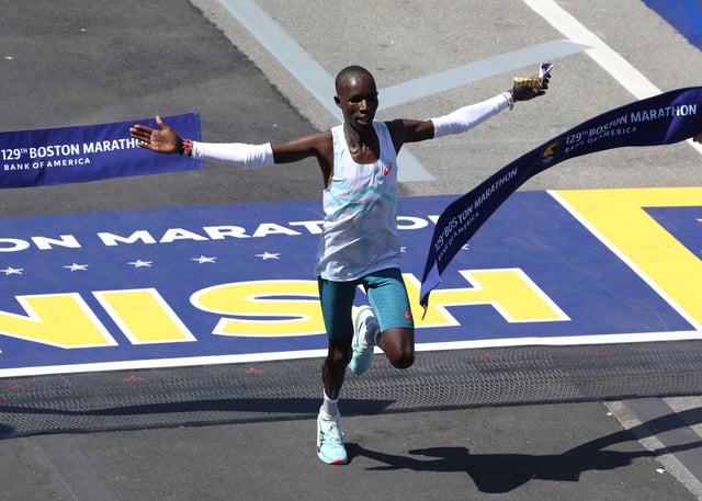 Athletics - The 129th Boston Marathon - Boston, Massachusetts, U.S. - April 21, 2025 Kenya's John Korir crosses the line to win the men's category in Boston Marathon REUTERS/Kylie Cooper