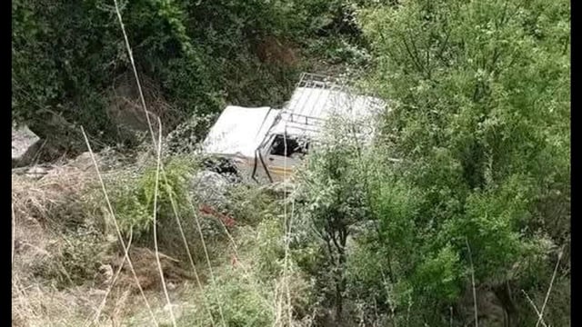 The Bolero Camper after it plunged into the gorge in Dodra Kwar region of Shimla district on Monday. (HT Photo)