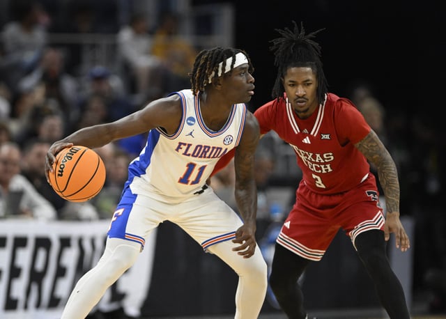 Mar 29, 2025; San Francisco, CA, USA; Florida Gators guard Denzel Aberdeen (11) drives to the hoop past Texas Tech Red Raiders guard Elijah Hawkins (3) during the second half during the West Regional final of the 2025 NCAA tournament at Chase Center. Mandatory Credit: Eakin Howard-Imagn Images/File Photo