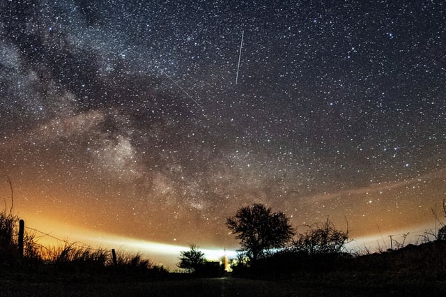 The Lyrid meteor shower is seen over Burg on the Baltic Sea island of Fehmarn off Germany in April 2018. 