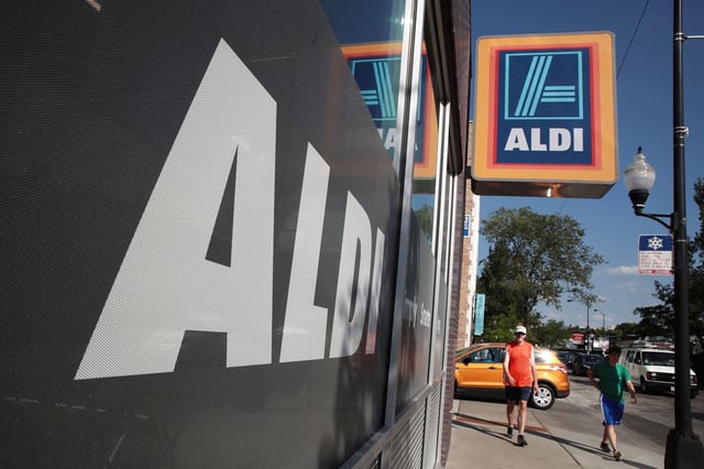 A sign hangs outside an Aldi grocery store in Chicago, Illinois.
