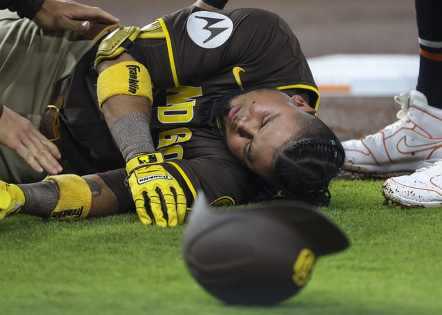 HOUSTON, TX – APRIL 20:  San Diego Padres designated hitter Luis Arraez (4) is knocked unconscious after colliding with Houston Astros second baseman Mauricio Dubón (14) (not pictured) in the top of the first inning during the MLB game between the San Diego Padres and Houston Astros at Daikin Park on April 20, 2025 in Houston, Texas.  (Photo by Leslie Plaza Johnson/Icon Sportswire via Getty Images)