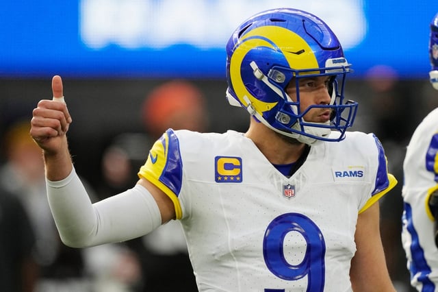 Rams quarterback Matthew Stafford says he is happy to have contract negotiations behind him and to begin working with All-Pro wide receiver Davante Adams. (AP Photo/Mark J. Terrill)