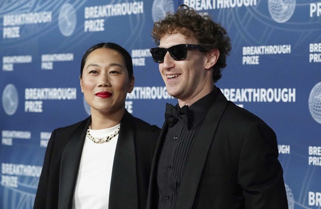Dr. Priscilla Chan, left, and Mark Zuckerberg arrive at the 11th Breakthrough Prize Ceremony on April 5, 2025, in Los Angeles. The Chan Zuckerberg Initiative announced Monday it will close The Primary School, a tuition-free private school serving low-income families in Silicon Valley, at the end of the 2025-26 school year.