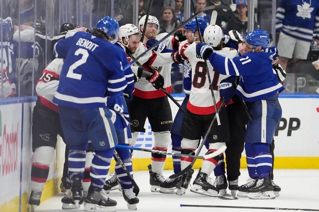 Toronto Maple Leafs and the Ottawa Senators rough it up during third period NHL playoff action in Toronto, on Sunday, April 20, 2025. THE CANADIAN PRESS/Frank Gunn