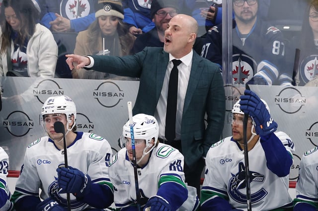 Mar 30, 2025; Winnipeg, Manitoba, CAN; Vancouver Canucks head coach Rick Tocchet gestures during a game against the Winnipeg Jets in the third period at Canada Life Centre. Mandatory Credit: James Carey Lauder-Imagn Images