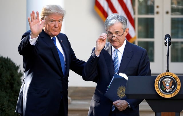 U.S. President Donald Trump gestures with Jerome Powell, his nominee to become chairman of the U.S. Federal Reserve at the White House in Washington, U.S., November 2, 2017. REUTERS/Carlos Barria/File Photo