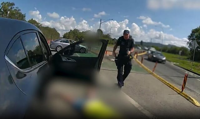 Queensland police have released bodycam vision of the arrest after a fatal six-car crash and shooting. 