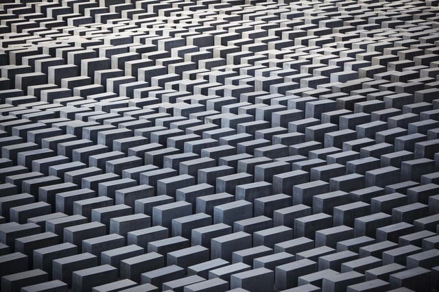 FILE - General view of the Memorial for the murdered Jews of Europe, the so called Holocaust Memorial in central Berlin, Germany, June 17, 2011. (AP Photo/Markus Schreiber, File)