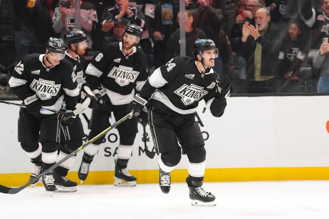 Apr 21, 2025; Los Angeles, California, USA; LA Kings center Phillip Danault (24) celebrates after scoring a goal against the Edmonton Oilers in the second period of game one of the first round of the 2025 Stanley Cup Playoffs at Crypto.com Arena. Mandatory Credit: Kirby Lee-Imagn Images
