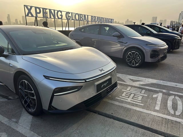 Chinese electric vehicle (EV) maker Xpeng displays its lineup of SUVs and sedans at a company event by the Victoria Harbour in Hong Kong, China April 15, 2025. REUTERS/Brian Thevenot