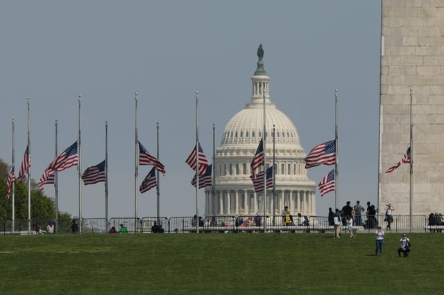 The U.S. flag flies at half staff near the Washington Monument on the National Mall in honor of Pope Francis on April 21, 2025 in Washington, DC. U.S. President Donald Trump ordered U.S. flags to be lowered to half-staff in honor of the Pope who died at age 88.