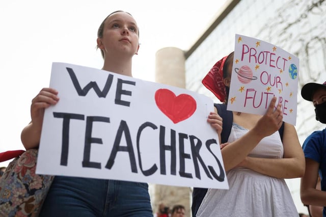 Student protestors hold signs while participating in the “Hands Off Our Schools” rally in front of the U.S. Department of Education on April 4, 2025, in Washington, D.C. Students from Georgetown University, Howard University, American University, George Washington University, George Mason University, and Temple University gathered to protest President Donald… (Kayla Bartkowski/Getty Images North America/TNS)