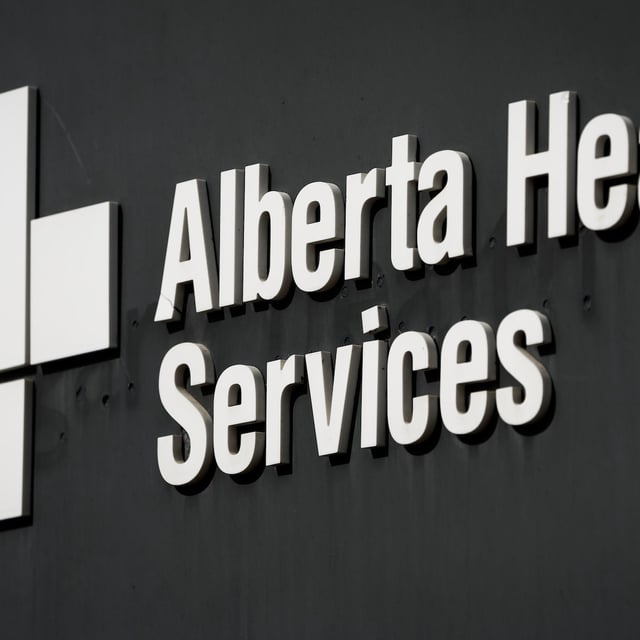 An Alberta Health Services sign is pictured outside the Rockyview General Hospital in Calgary, Thursday, March 20, 2025. Health officials in Alberta are reporting 29 new cases of measles, bringing the province's total to 118 since early March. THE CANADIAN PRESS/Jeff McIntosh