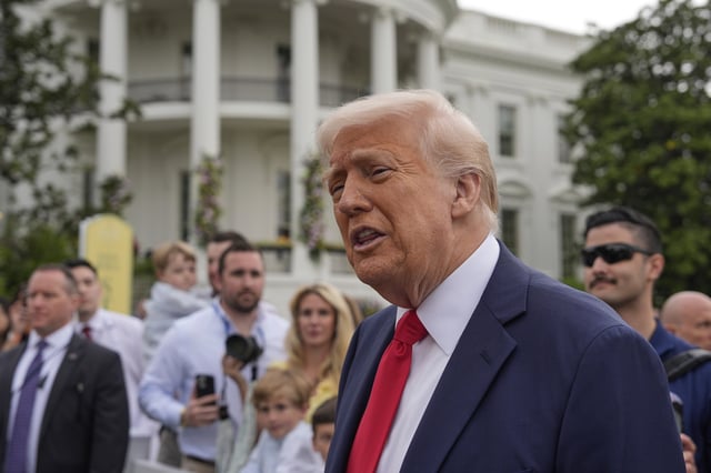 President Donald Trump speaks to reporters during the White House Easter Egg Roll on the South Lawn of the White House, Monday, April 21, 2025, in Washington. (AP Photo/Alex Brandon)
