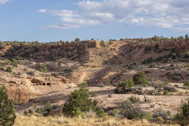 Right-of-way of a buried underground high-pressure natural gas pipeline crossing the desert in the canyon country of Utah.