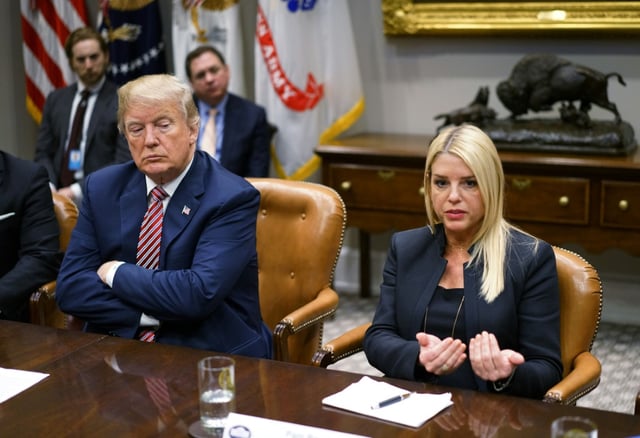 US President Donald Trump (L) has tasked Attorney General Pam Bondi with ending the  "persecution" of Christians