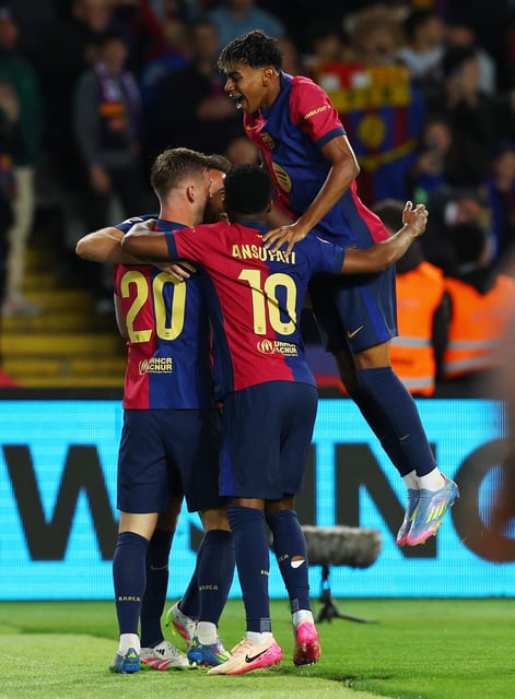 Soccer Football - LaLiga - FC Barcelona v RCD Mallorca - Estadi Olimpic Lluis Companys, Barcelona, Spain - April 22, 2025 FC Barcelona's Dani Olmo celebrates scoring their first goal with Lamine Yamal, Ansu Fati and teammates REUTERS/Albert Gea