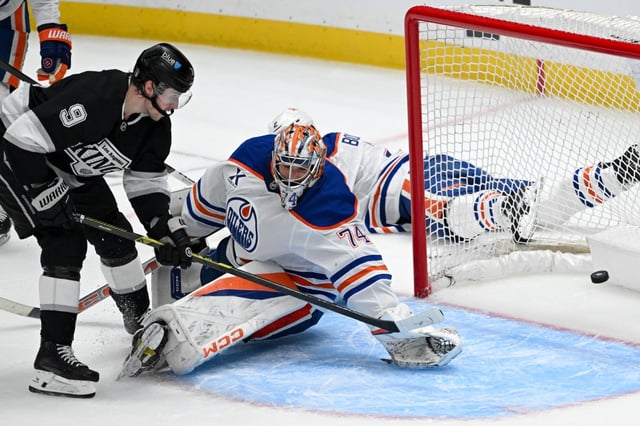 The Kings’ Adrian Kempe, left, scores past Edmonton goalie Stuart Skinner during the second period of Game 1 of their first-round playoff series Monday, April 21, 2025, at Crypto.com Arena. (Photo by David Crane, Los Angeles Daily News/SCNG)