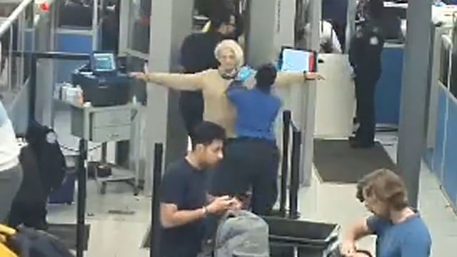 In this still from Port Authority of New York and New Jersey video obtained by CNN, Svetlana Dali gets patted down after going through a security checkpoint.
