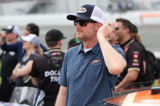Hall of Famer and JR Motorsports team owner, Dale Earnhardt Jr. waits on the grid prior to the NASCAR Cup Series Daytona 500 at Daytona International Speedway on February 16, 2025 in Daytona Beach, Florida.