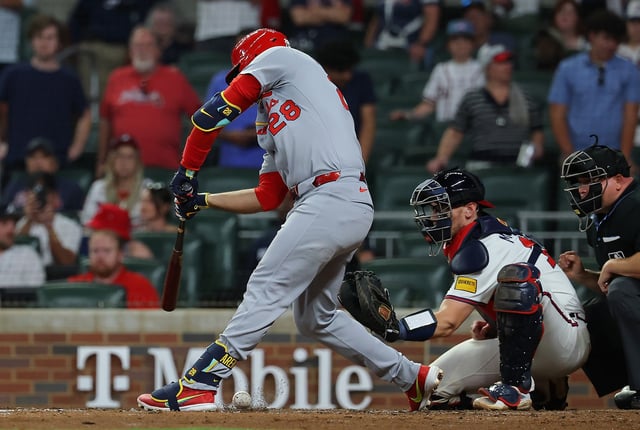 ATLANTA, GEORGIA - APRIL 21: Nolan Arenado #28 of the St. Louis Cardinals grounds out softly to Sean Murphy #12 of the Atlanta Braves in the ninth inning to give the Braves a 7-6 win at Truist Park on April 21, 2025 in Atlanta, Georgia.