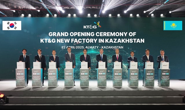 KT&G Chief Executive Officer (CEO) Bang Kyung-man (5th from L), Governor of Almaty Province Marat Sultangaziyev (6th from L) and other officials from the two sides attend the opening ceremony of KT&G's 4th overseas plant in Almaty, Kazakhstan, in this photo taken April 22, 2025, and provided by KT&G Corp. (PHOTO NOT FOR SALE) (Yonhap)