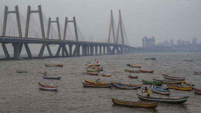Mumbai, India - May 15, 2021: Fishermen row their boats to safety by parking them at the shore at Worli Koliwada, as Cyclone Tauktae intensifies and is likely to impact the Western coasts of Maharashtra, in Mumbai, India, on Saturday, May 15, 2021. (Photo by Pratik Chorge/Hindustan Times) (Pratik Chorge/HT PHOTO)