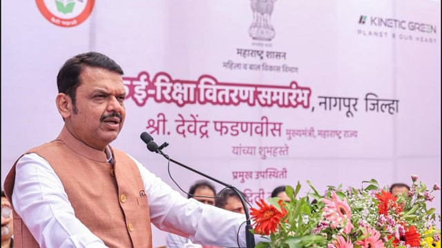 Nagpur, Apr 20 (ANI): Maharashtra Chief Minister Devendra Fadnavis addresses the gathering during the 'Pink E-Rickshaw Distribution Ceremony', in Nagpur on Sunday. (ANI Photo) (CMO Maharashtra - X)