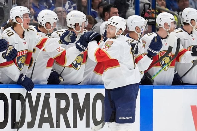 Florida Panthers left wing Matthew Tkachuk (19) celebrates with the bench after scoring against the Tampa Bay Lightning during the second period in Game 1 of an NHL hockey Stanley Cup first-round playoff series, Tuesday, April 22, 2025, in Tampa, Fla. (AP Photo/Chris O&#39;Meara)