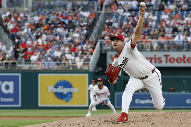Apr 22, 2025; Washington, District of Columbia, USA; Washington Nationals pitcher Mitchell Parker (70) pitches against the Baltimore Orioles during the second inning at Nationals Park. Mandatory Credit: Geoff Burke-Imagn Images