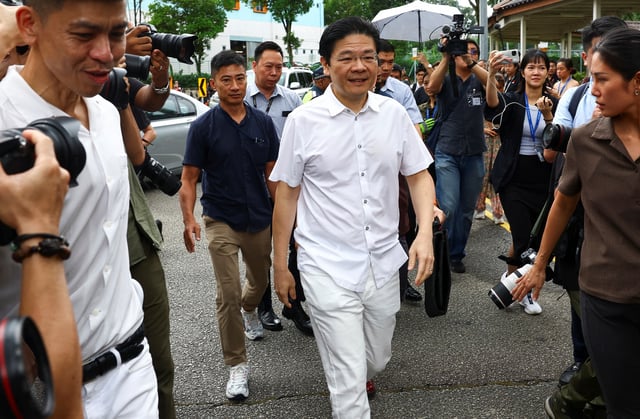 Singapore’s Prime Minister Lawrence Wong arrives at a nomination center ahead of the general election in Singapore April 23, 2025. REUTERS/Edgar Su