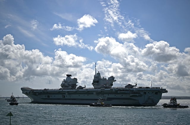 British aircraft carrier HMS Prince of Wales leaves from Portsmouth Naval Base on the south coast of England on April 22, 2025.