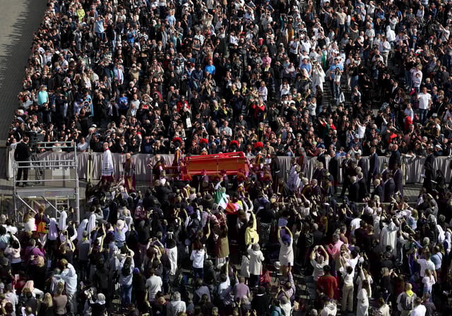 Pope Francis' body is carried in a coffin into Saint Peter's Basilica at the Vatican on the day of its translation, at the Vatican, April 23, 2025. REUTERS/Guglielmo Mangiapane
