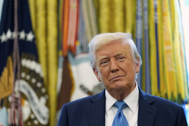 President Donald Trump watches as Treasury Secretary Scott Bessent participates in a ceremonial swearing in of Paul Atkins as chairman of the Securities and Exchange Commission, in the Oval Office of the White House, Tuesday, April 22, 2025, in Washington.