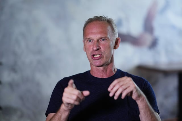FILE - Former NHL goalkeeper Dominik Hasek gestures during an interview with The Associated Press in Prague, Czech Republic, Wednesday, June 28, 2023. (AP Photo/Petr David Josek, File)