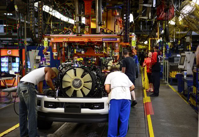 Workers assemble a Ford truck at the new Louisville Ford truck plant in Louisville, Kentucky, U.S. September 30, 2016.  REUTERS/Bryan Woolston/File Photo