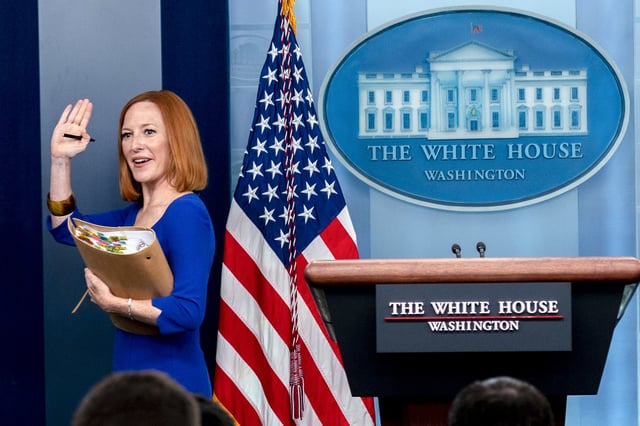 FILE - White House press secretary Jen Psaki waves goodbye at her last press briefing at the White House in Washington, May 13, 2022. (AP Photo/Andrew Harnik, File)