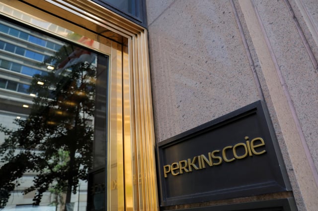 Signage is seen outside of the law firm Perkins Coie at their legal offices in Washington, D.C., U.S., May 10, 2021. REUTERS/Andrew Kelly/File Photo