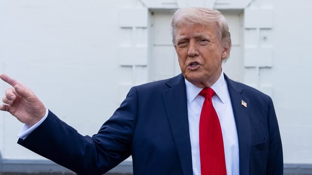 President Donald Trump speaks with reporters at the White House, Wednesday,