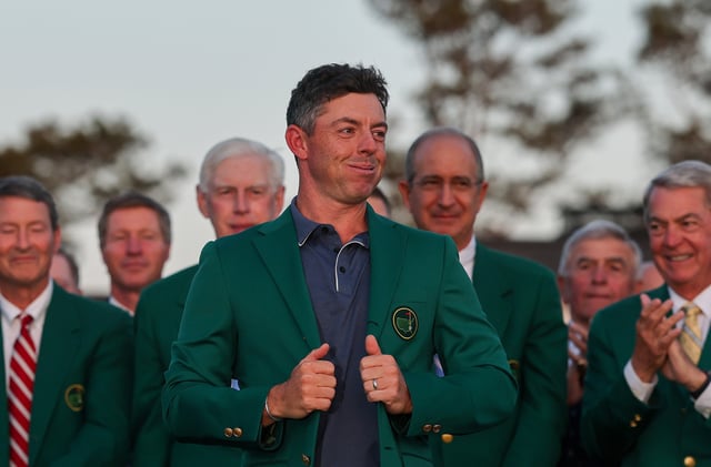 AUGUSTA, GEORGIA - APRIL 13: Rory McIlroy of Northern Ireland reacts as he puts on the Green Jacket during the ceremony after the 2025 Masters Tournament at Augusta National Golf Club on April 13, 2025 in Augusta, Georgia.