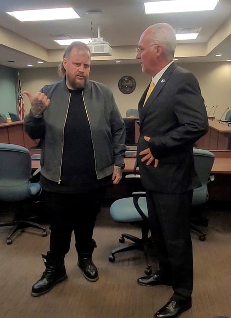 (From left) Jelly Roll and Nashville Sheriff Daron Hall at the singer's Tennessee Board of Parole hearing on Tuesday in Nashville.