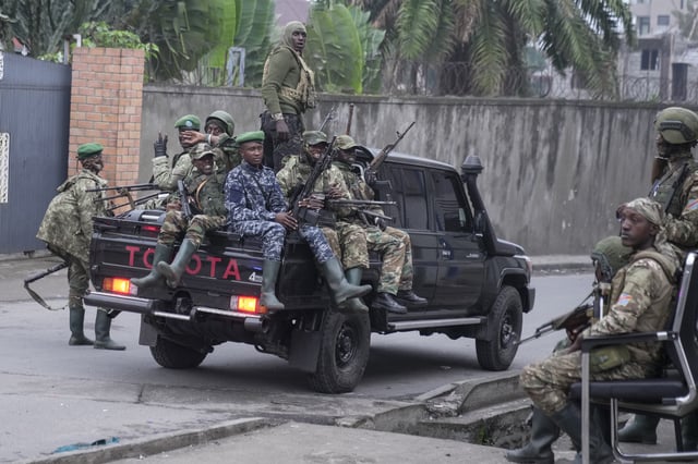 FILE - M23 rebels patrol the streets of Goma, Democratic Republic of the Congo, Wednesday, Jan. 29, 2025. (AP Photo/Brian Inganga, File)